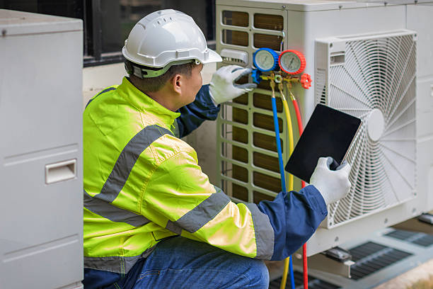 Professional Emergency Hvac Repair technician working in West Finley, PA